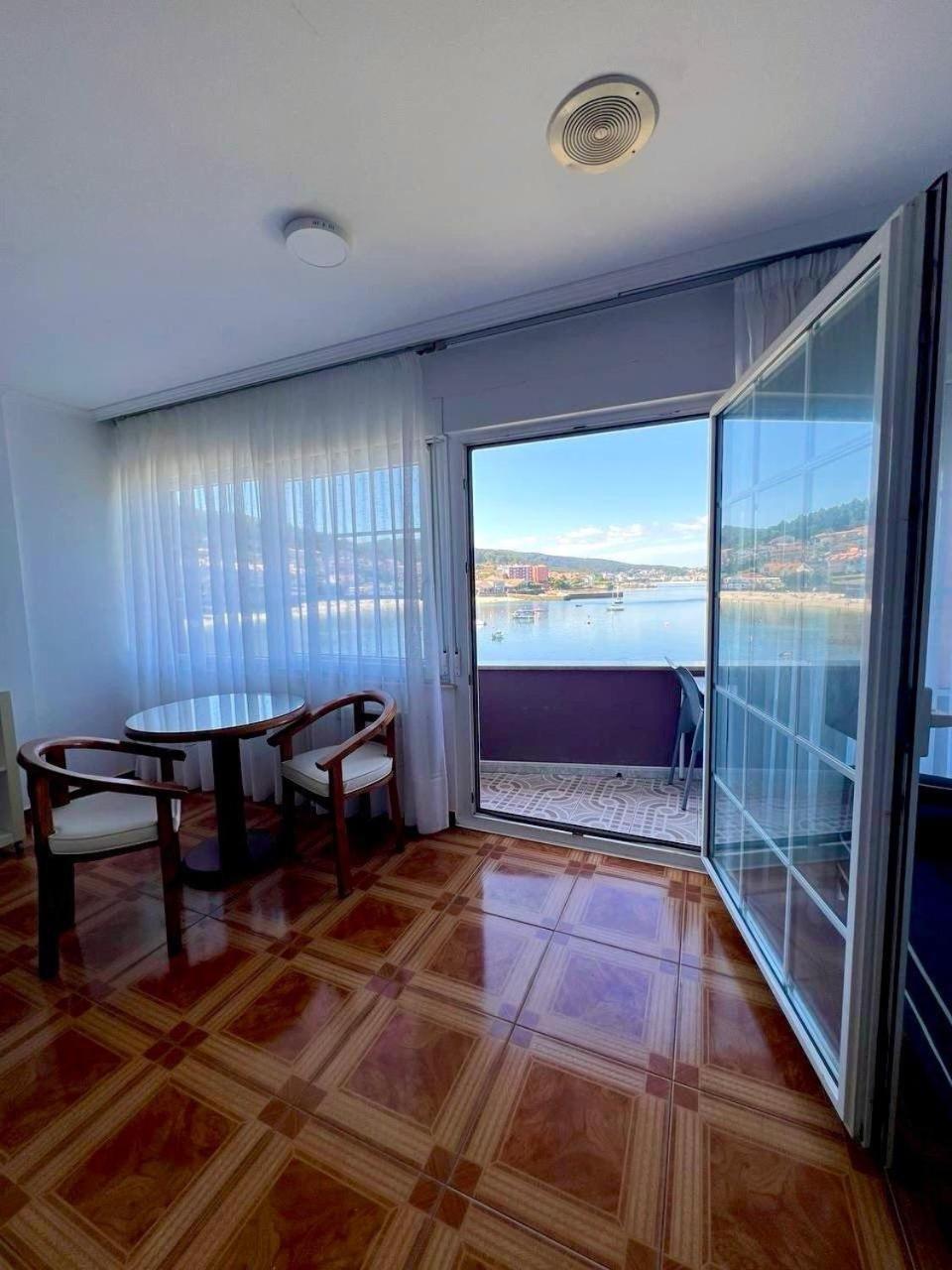 Hotel Corcubion Playa De Quenxe Kamer foto